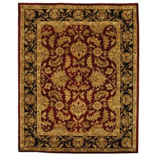 Handmade Heritage Kashan Burgundy/ Black Wool Rug (83 X 11) (RedPattern OrientalMeasures 0.625 inch thickTip We recommend the use of a non skid pad to keep the rug in place on smooth surfaces.All rug sizes are approximate. Due to the difference of monit