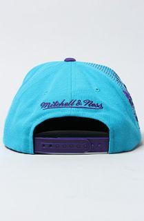 Mitchell & Ness The Charlotte Hornets Laser Stitch Snapback Cap in Teal Purple