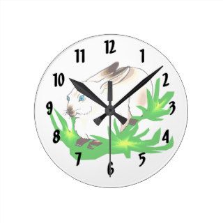 Californian blue eyed rabbit in green grass.png round clocks