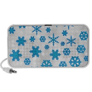 Cute Blue Glitter Snow Flakes on Snowy Background  Speakers