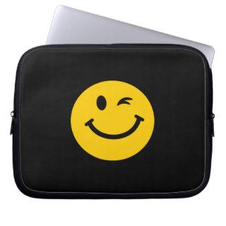 Winking smiley face laptop sleeve