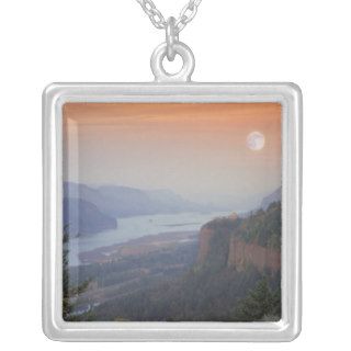 The moon hangs in the sky above the Vista Custom Jewelry