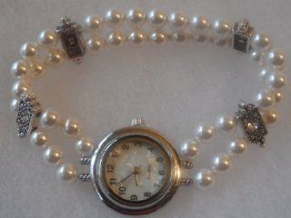 White Swarovski Pearl and Element Stretch Bracelet Quartz Watch at  Women's Watch store.