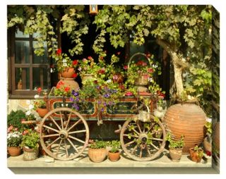 West of the Wind Flower Wagon Outdoor Canvas Art   Outdoor Wall Art