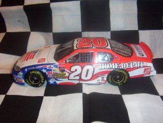 2003 NASCAR Action Racing Collectables . . . Tony Stewart #20  / Independence Day Chevy Monte Carlo 1/24 Diecast . . . Limited Edition 1 of 23,940 