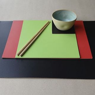 set of four square leather placemats by artbox