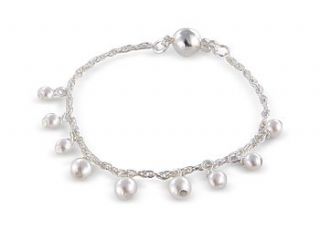 delicate silver chain and pearl bracelet by radiance boutique