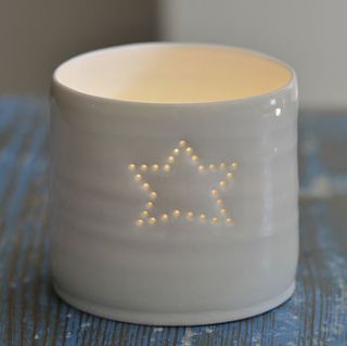 porcelain single star tea light by luna lighting