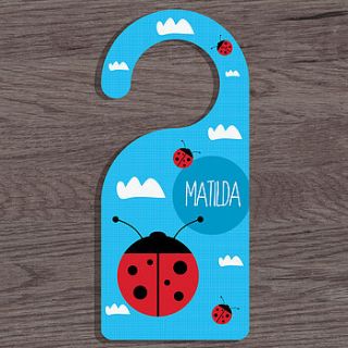 personalised 'ladybird' door hanger by a piece of ltd