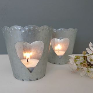 two metal heart tea light holders by the lovely light company