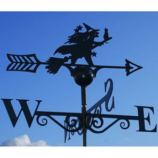 witch and cat weathervane by the orchard