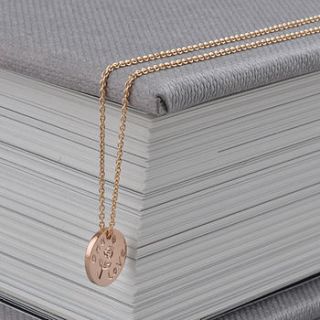 mini gold one love necklace by lindsay pearson