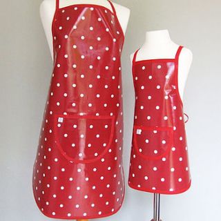 red spotty oilcloth apron by pinnikity