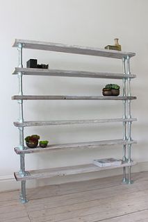 reclaimed wood and steel pipe shelving by inspirit