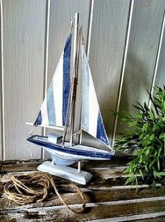 wooden sailing boat by the hiding place