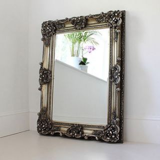 silver ornate mirror by out there interiors
