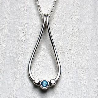 blue topaz handmade pebble pendant by alison moore silver designs