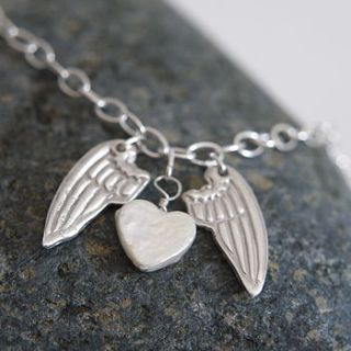 personalised silver mini angel wing necklace by dizzy