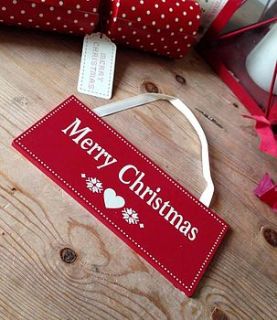 wooden christmas sign by the hiding place