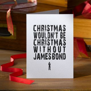 pack of four james bond christmas cards by betsy benn