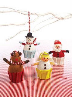 knitted traditional christmas decorations by the contemporary home