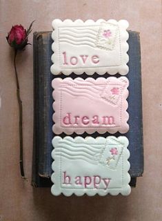 box of three love.dream.happy cookies by nila holden