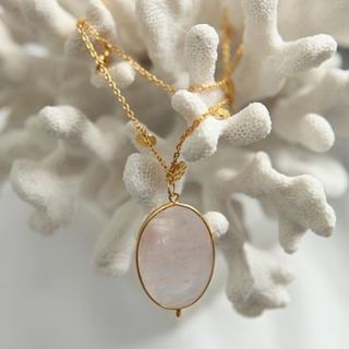 gold necklace with rose quartz pendant by amara amara