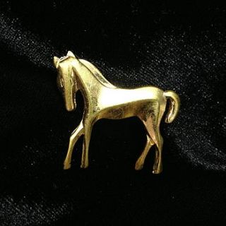 vintage gold tone horse brooch by iamia