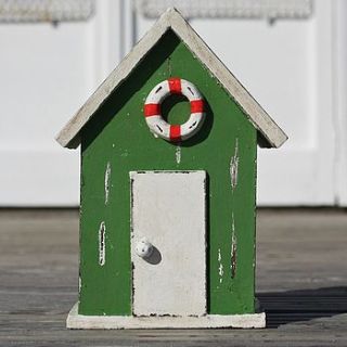 beach hut money box by buy the sea