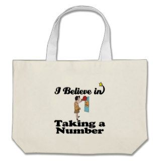 i believe in taking a number tote bags