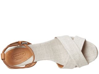 Add a touch of elegance to your ensemble with this modern wedge sandal