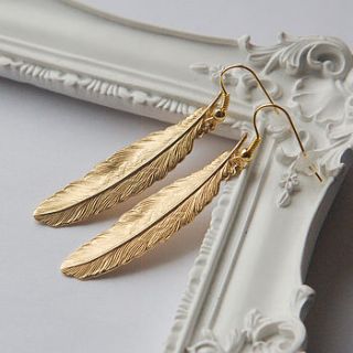 gold feather earrings by maria allen boutique