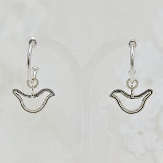 hoop earrings with baby bird charm by catherine amesbury