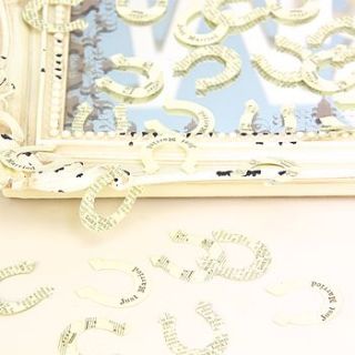 newsprint horseshoe table confetti by lisa angel wedding