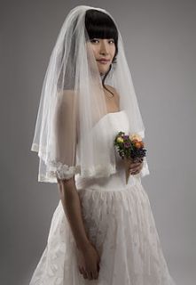 silk tulle veil with daisy lace trim by faulkner & carter london