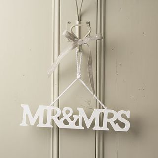 wooden mr and mrs wedding sign by the contemporary home