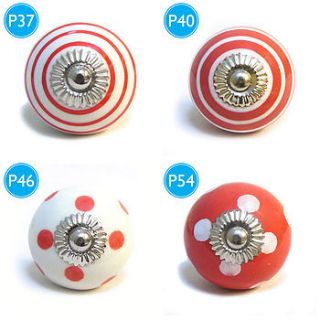 red spots & stripes ceramic cupboard knob by pushka knobs