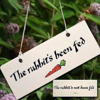 wooden sign 'the rabbit's been fed' by angelic hen