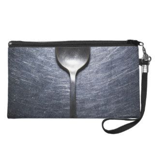 Metal spoon on stainless steel wristlet clutches