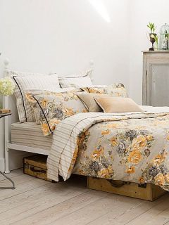 Christy Ochre bloom bed linen