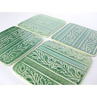 green or blue ceramic coasters   set of four by lauren denney