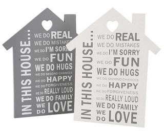house rules wooden sign by the contemporary home