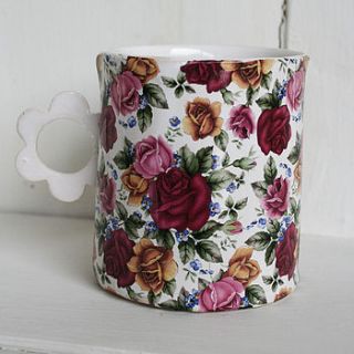 handmade ceramic mug with flower handle by jmgceramics
