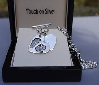 classic toggle necklace with personalised hand/footprint charm by touch on silver
