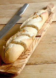 wooden salami / garlic bread cutting board by the rustic dish