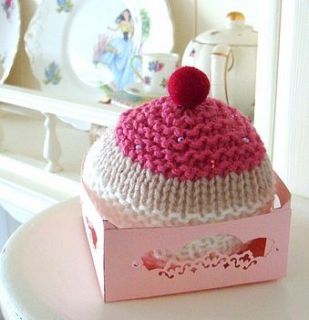 hand knitted cake with a cherry on the top by plump pudding