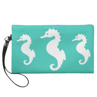 White Seahorse Silhouettes On Turquoise Wristlet Purses