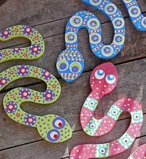 wooden snake decorations by half an acre