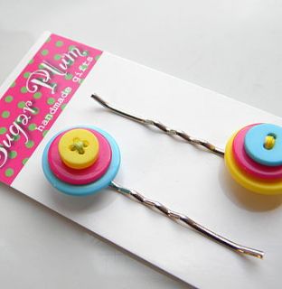 brightly coloured button hair clips by sugar plum handmade gifts