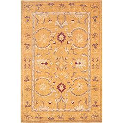 Hand knotted Harvest Moon Gold Wool Contemporary Rug (6 X 9)